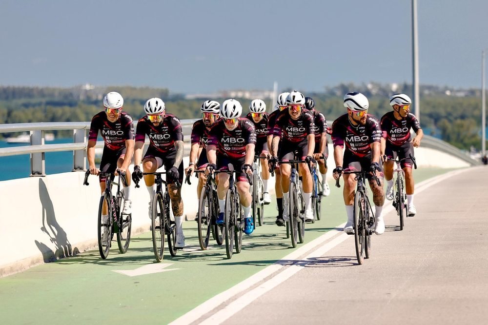 Cyclists on a Miami causeway bridge — bike tune-up service